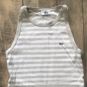 Lacoste sleeveless top. Beige and white stripes.